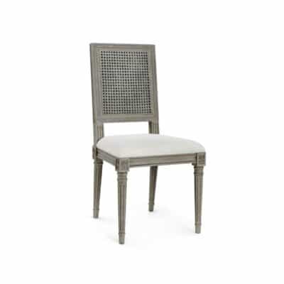 Front view of Giselle Louis XVI style side chair featuring soft grey finish, natural linen seat, and intricate cane back design.