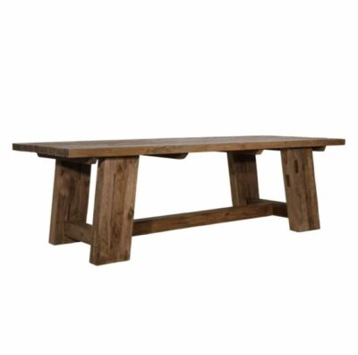 Natural finish reclaimed teak dining table, sturdy design for outdoor use.