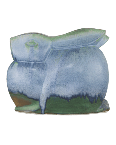 Handcrafted blue porcelain object, featuring vibrant reactive glaze in shades of blue and green.