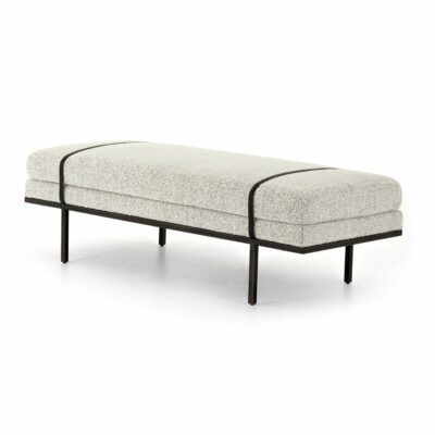 Front view of Domino bench with grey upholstery, black leather bands, and gunmetal finish.