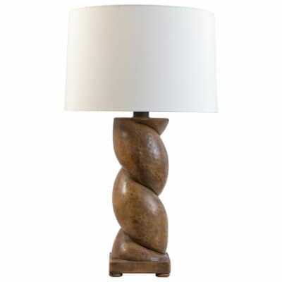 Close-up of French Twist Lamp, featuring elegant wood base with intricate design.