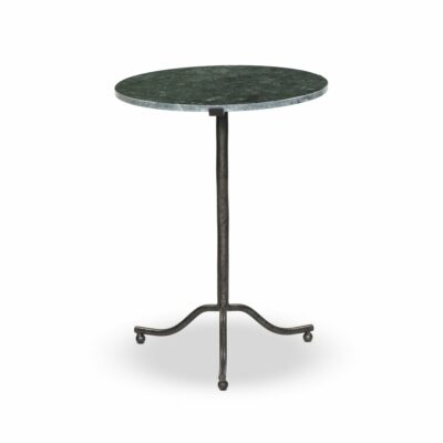 Close-up of round marble end table with black matte iron tripod base and ball feet showcasing unique veining pattern in dark green
