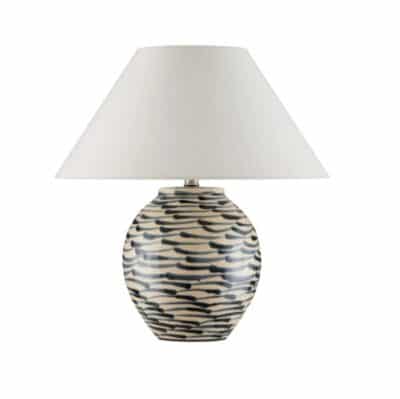 Close-up of Minnow Blue Table Lamp featuring navy blue and beige ceramic finish, 6' clear silver cord, and a single light socket.