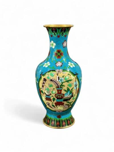Vintage tall teal cloisonne vase with intricate floral design.