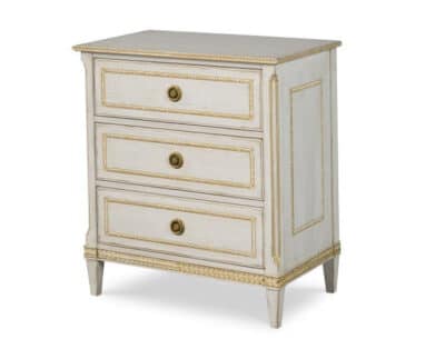 Side view of Valerie Whitewashed Nightstand featuring elegant gold accents and antique brass hardware.