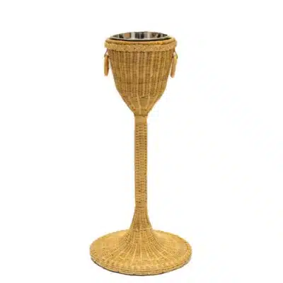 Close-up of Wicker Champagne Stand featuring wicker body and stainless steel bucket insert.