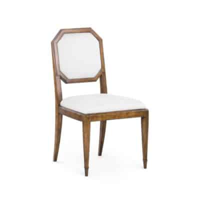 Close-up of Octagonal Seat Back Dining Chair in plush faux shaved chenille upholstery, featuring elegant walnut finish on rubberwood.