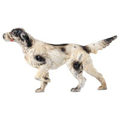 Standing Springer Spaniel in vintage metal, featuring traditional black and white markings with aged patina.