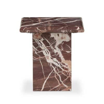 Monolithic marble side table showcasing rich natural veining, offering elegance in merlot or cream hues.