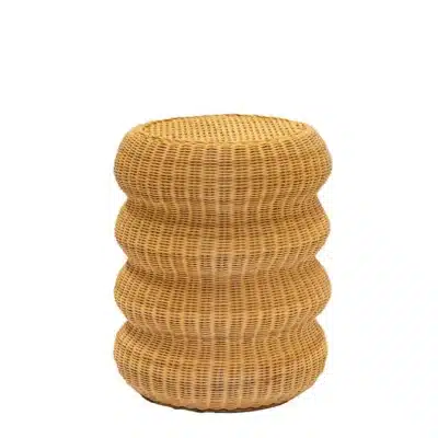Stacked wicker stool with handwoven texture, showcasing natural color variations.