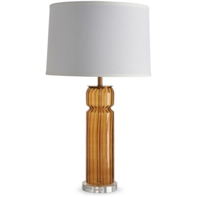 Close-up of Daria Faceted Glass Lamp with white linen shade, brass hardware, and amber base.