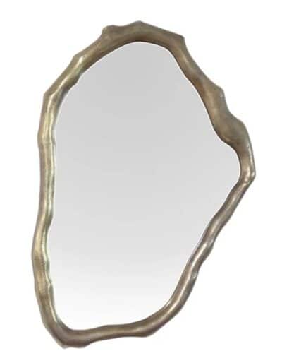 Organic-shaped cast aluminum mirror, featuring an elegant design in bronze finish.