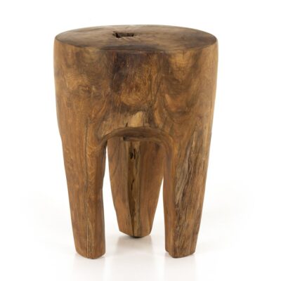 Close-up of aged teak stump table with natural grain and weathered finish.