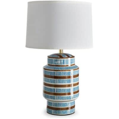 Close-up of Ceska Ceramic Table Lamp with multi-colored design, featuring white linen shade and three-way switch base.