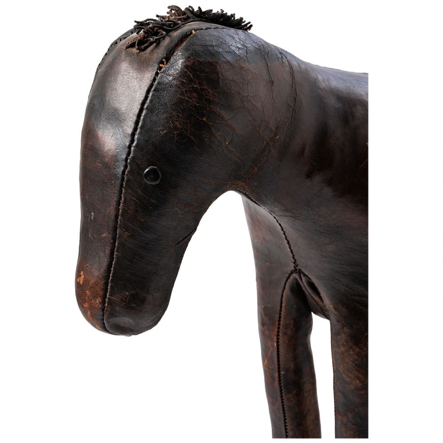 Close-up of Antique English Leather Horse Footstool, showcasing aged leather patina and intricate details.
