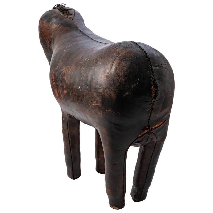 Close-up of Antique English Leather Horse Footstool showcasing aged leather, patina, and intricate details.