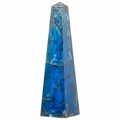 Close-up of vintage French cracked ice blue Lucite obelisk, showcasing intricate details and elegant design.