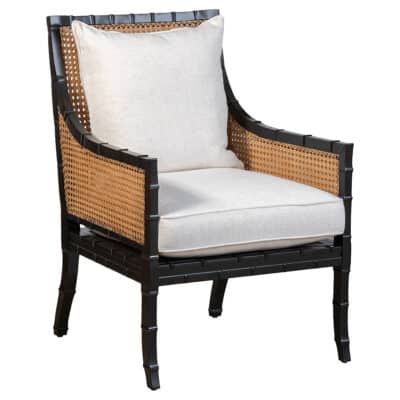 Close-up of Beau Chair featuring black mahogany double caned frame and upholstered cushion, showcasing elegance and comfort.