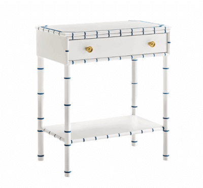 Front view of white side table with blue accents, featuring solid brass hardware.