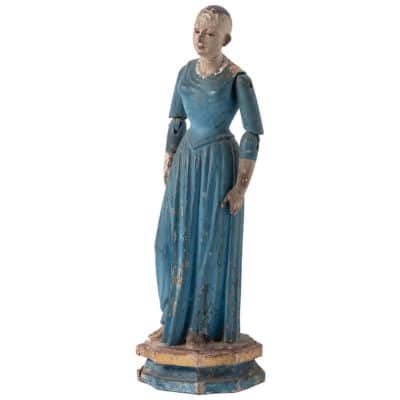 Antique blue painted wooden doll with intricate details, circa 18th century, Lisbon, Portugal.
