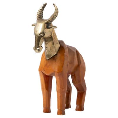 Brass-headed vintage antelope figurine in rich wood tones.