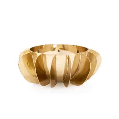 Brass finish hand-cut bowl, close-up view of intricate design details.