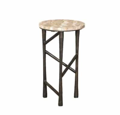 Close-up of Lucia Stone Drinks Table with marble top and hand-hammered iron base, showcasing unique stone pattern.