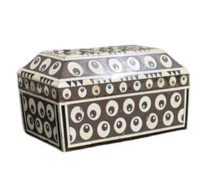 Close-up of Disco Bone Inlaid Box showcasing intricate eye pattern on lid.