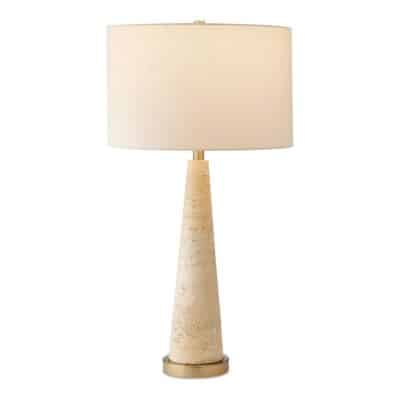 Close-up of Travertine Tapered Table Lamp in pale beige, featuring natural slubbing on linen shade and brass accents.