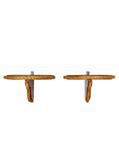 Side view of vintage wooden wall brackets featuring rope detail.