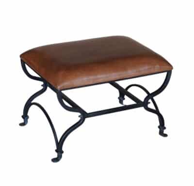 Close-up of Small Burton Stool with Cognac Leather Seat on Iron Base.