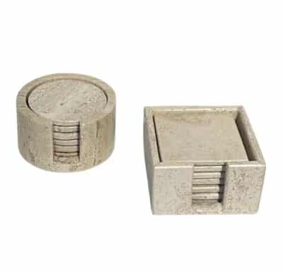 Set of six round stone coasters in a square stone container, featuring cork backing for elegance and functionality.