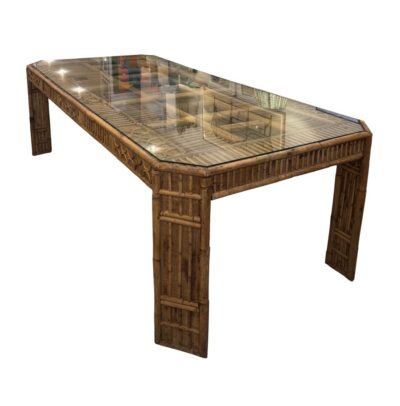 Front view of vintage Brighton Pavilion style dining table with glass top, showcasing intricate wooden design and dark finish.