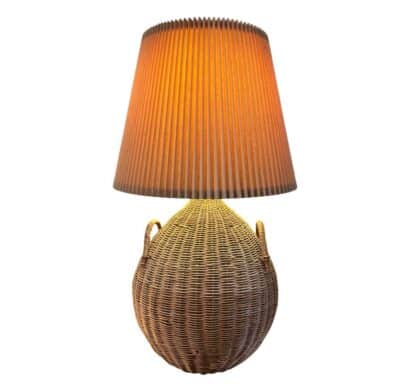 Close-up of Vintage French Basket Table Lamp featuring pleated shade in woven basket style, circa 1920s.
