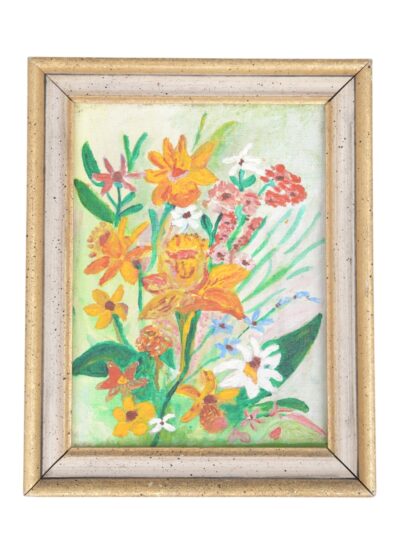 Close-up of a vintage framed wildflower painting featuring vibrant colors and intricate details.