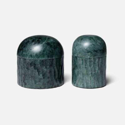 Glossy dark jade marble containers, one large and one small, set against a white background.
