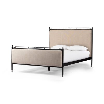 Antiqued black iron bed with French ticking stripe in king size, showcasing its elegant design and luxurious materials.
