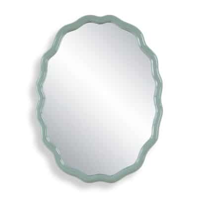 Scalloped oval mirror in robin's egg blue lacquer.