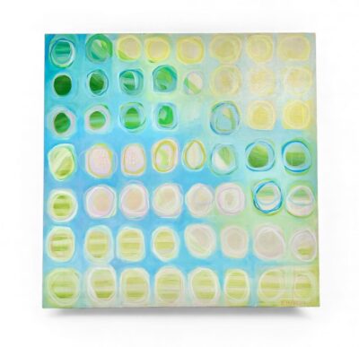 Bright abstract art piece featuring circles in blue, green, yellow, and white on canvas.