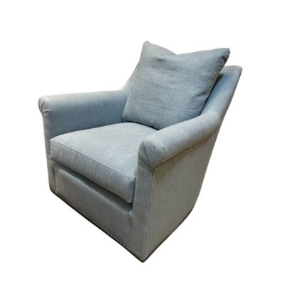 Close-up of Afton Blue Swivel Chair featuring rolled arms and plush upholstery, perfect for comfortable seating.