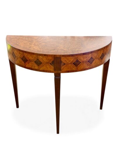 A beautifully crafted marquetry half round table showcasing intricate inlays of walnut, rosewood, and maple veneer.