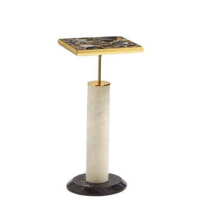 Close-up of polished agate, brass, and marble side table with intricate patterns on top.