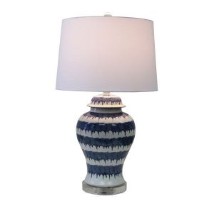 Blue and white drip porcelain table lamp with acrylic base on a white background.
